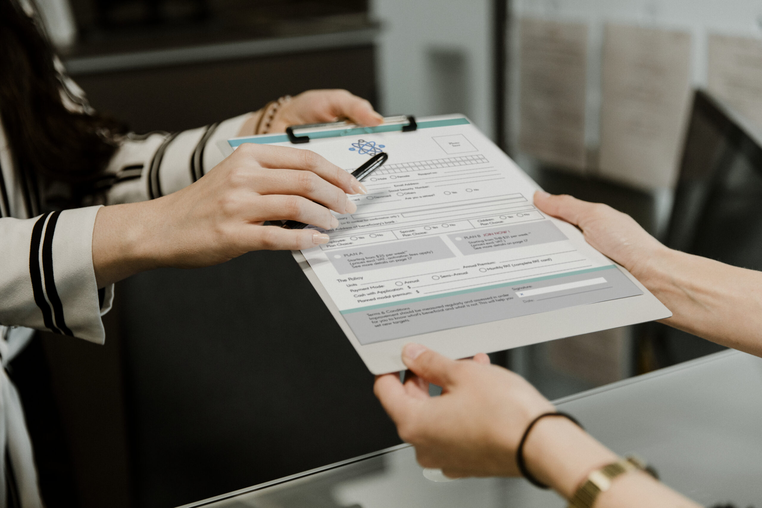 Woman handing over the form