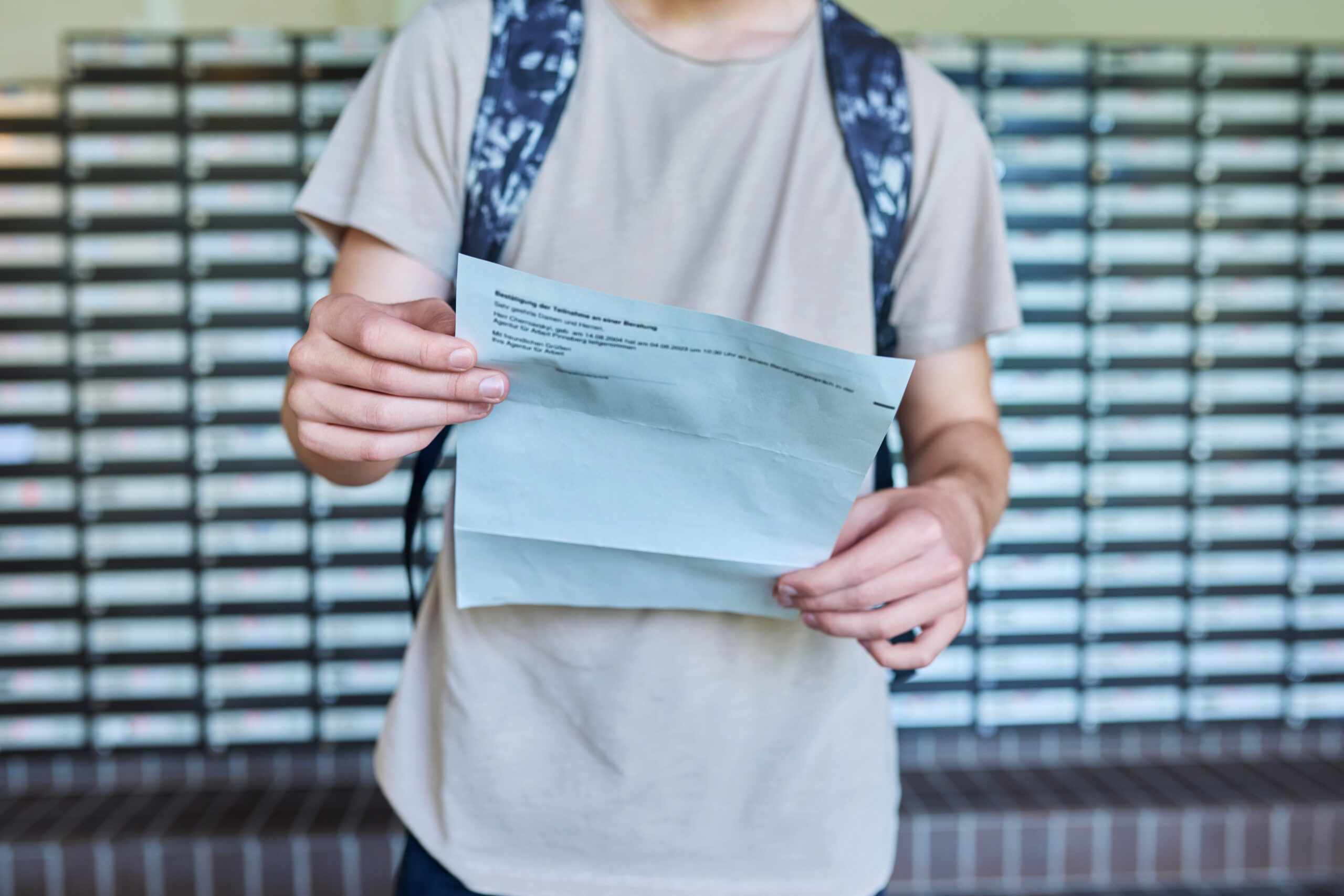 Close up of an important official letter in hands of guy