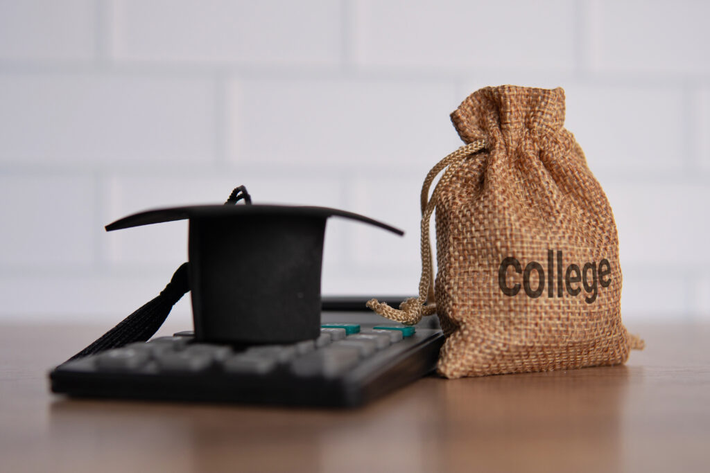 closeup image of graduation cap calculator and mo 2024 05 06 20 30 08 utc