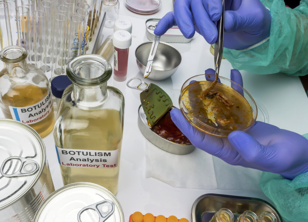 Experienced laboratory scientist analyzing a sample from a canned food can, botulism infection in sick people, conceptual image