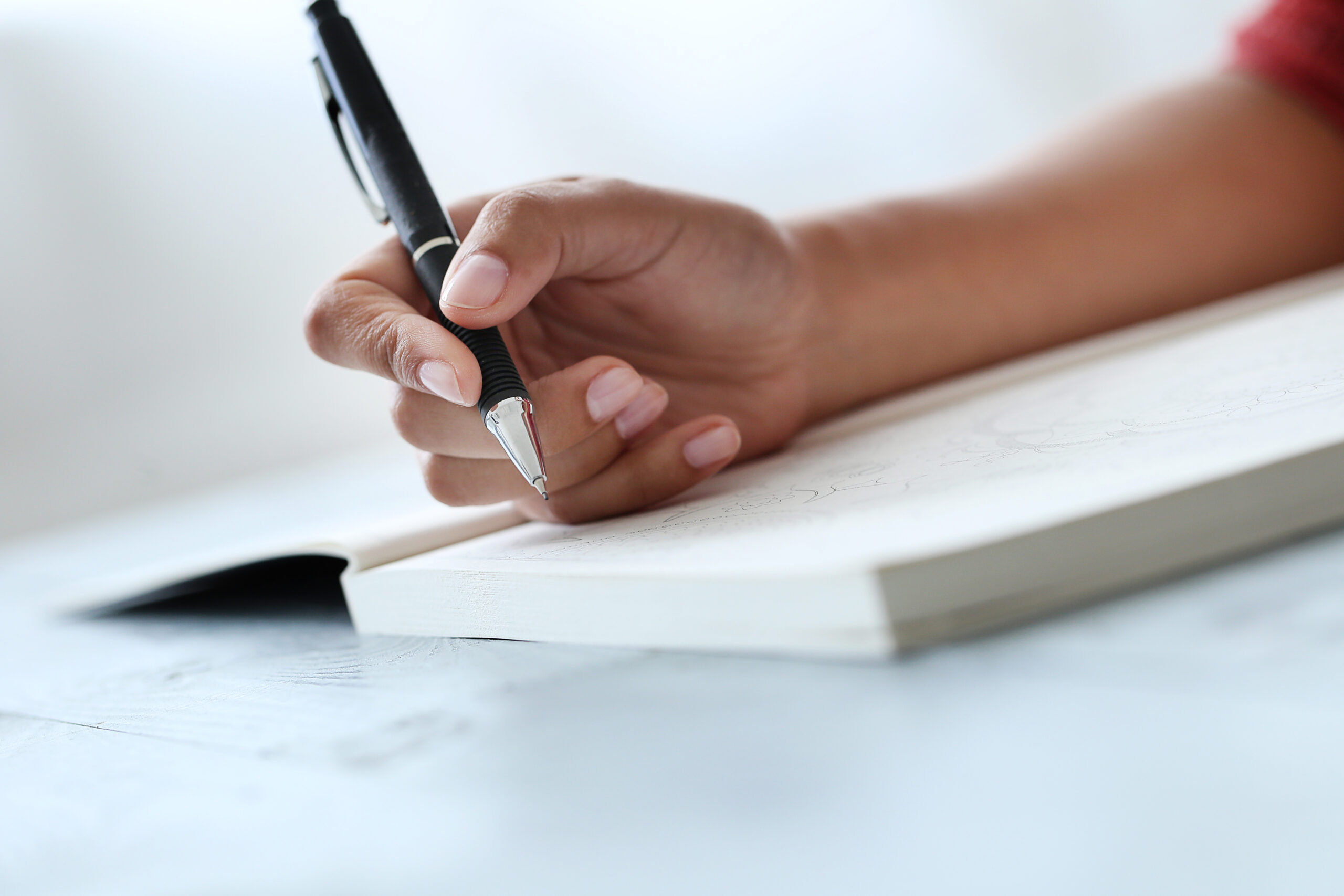 Woman with pen