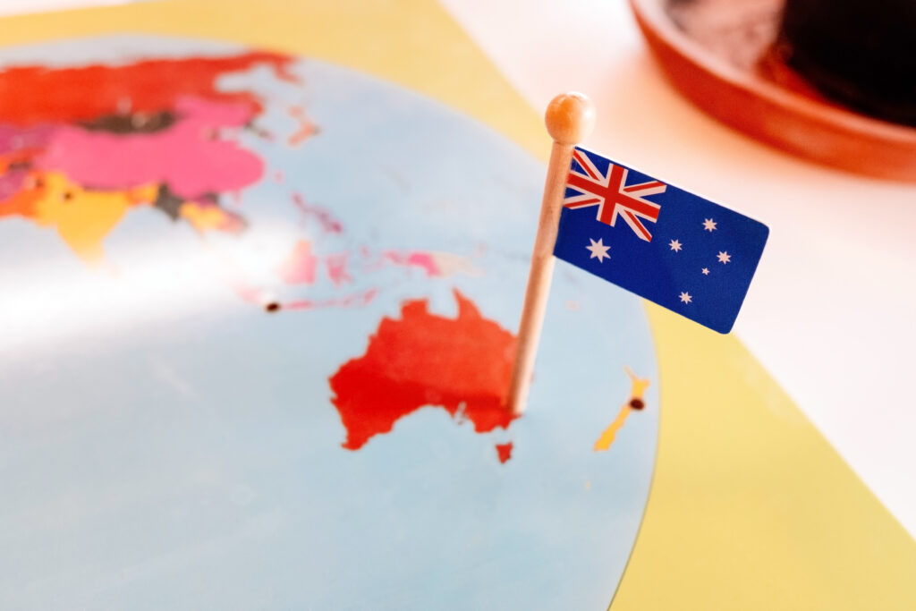An Australian flag pinned to a Montessori map of Oceania contine