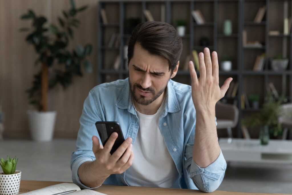 Telephone,Problem.,Upset,Angry,Millennial,Male,Feel,Outraged,By,Bad